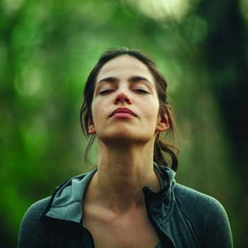 Young,Beautiful,Woman,Exercise,In,The,Forest