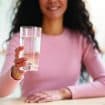 Healthy,Drink.,Unrecognizable,Smiling,Lady,Offering,Glass,With,Mineral,Water