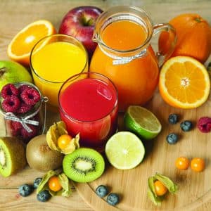Sweet,Juice,And,Fruits,On,Wood